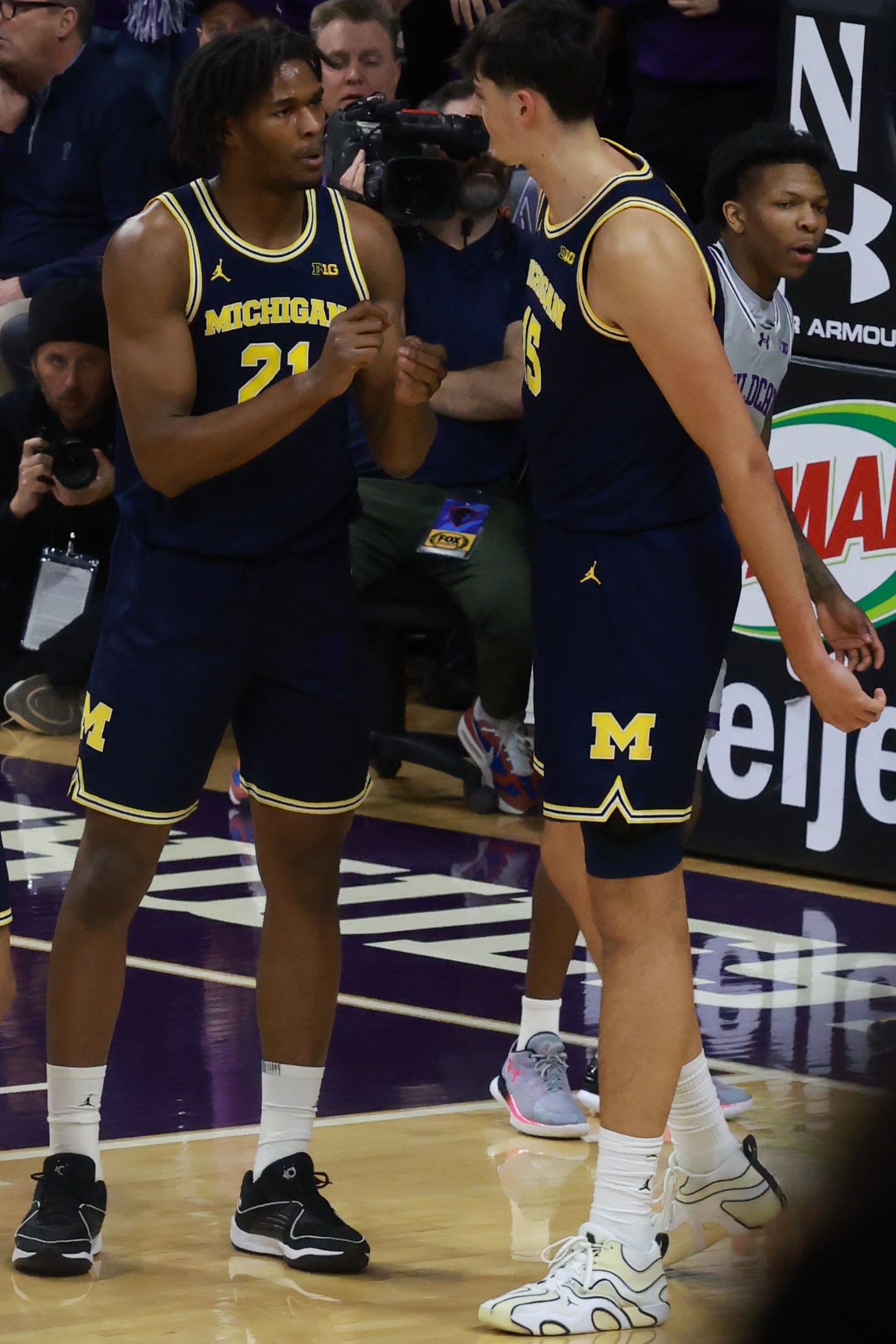 w:Morez Johnson Jr. and w:Aday Mara at the February 11, 2026 game between the w:2025–26 Michigan Wolverines men's basketball team and the w:2025–26 Northwestern Wildcats men's bask