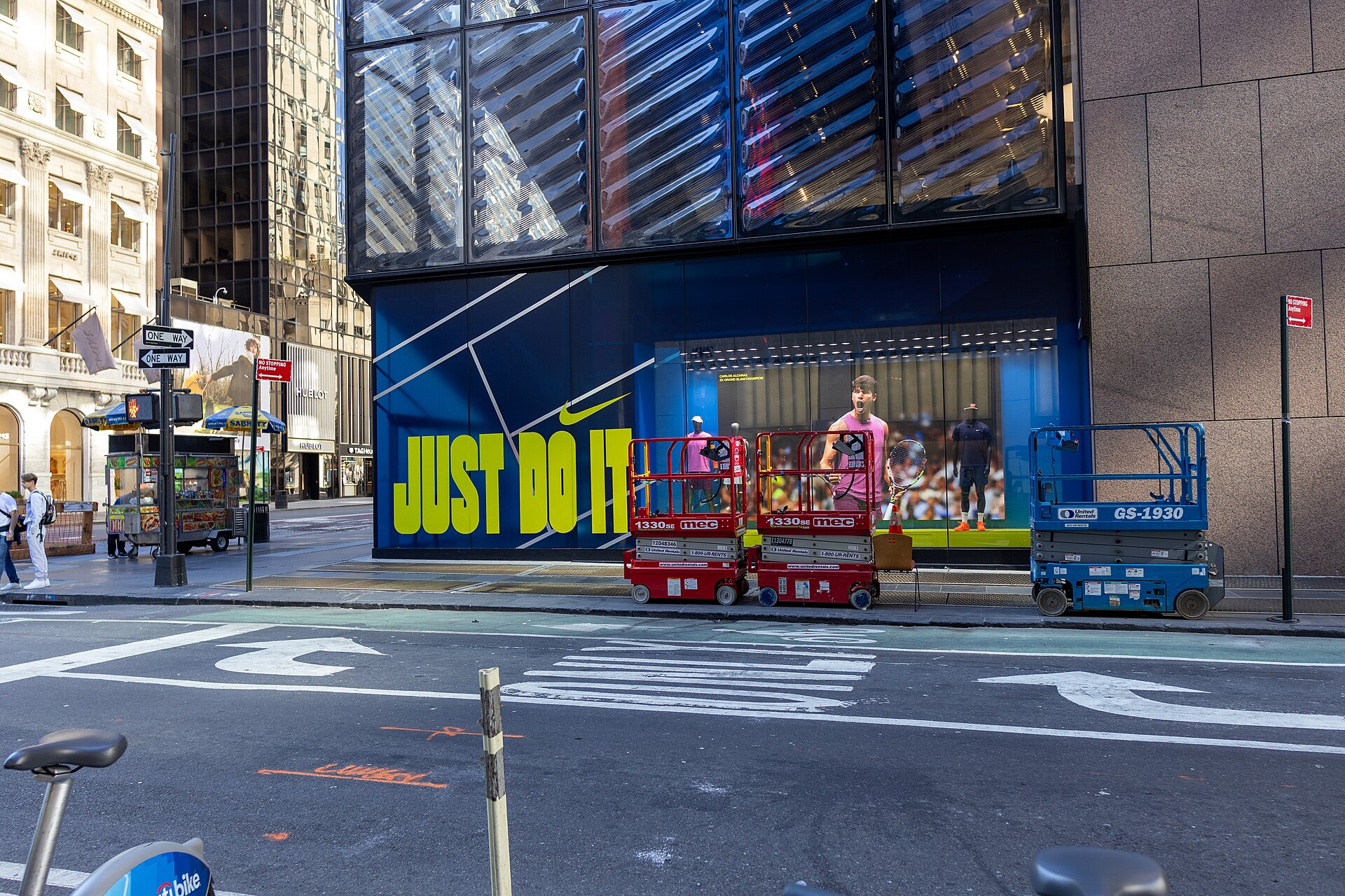 A Nike store in New York City, New York, United States displaying an advertisement featuring Spanish tennis player Carlos Alcaraz.
