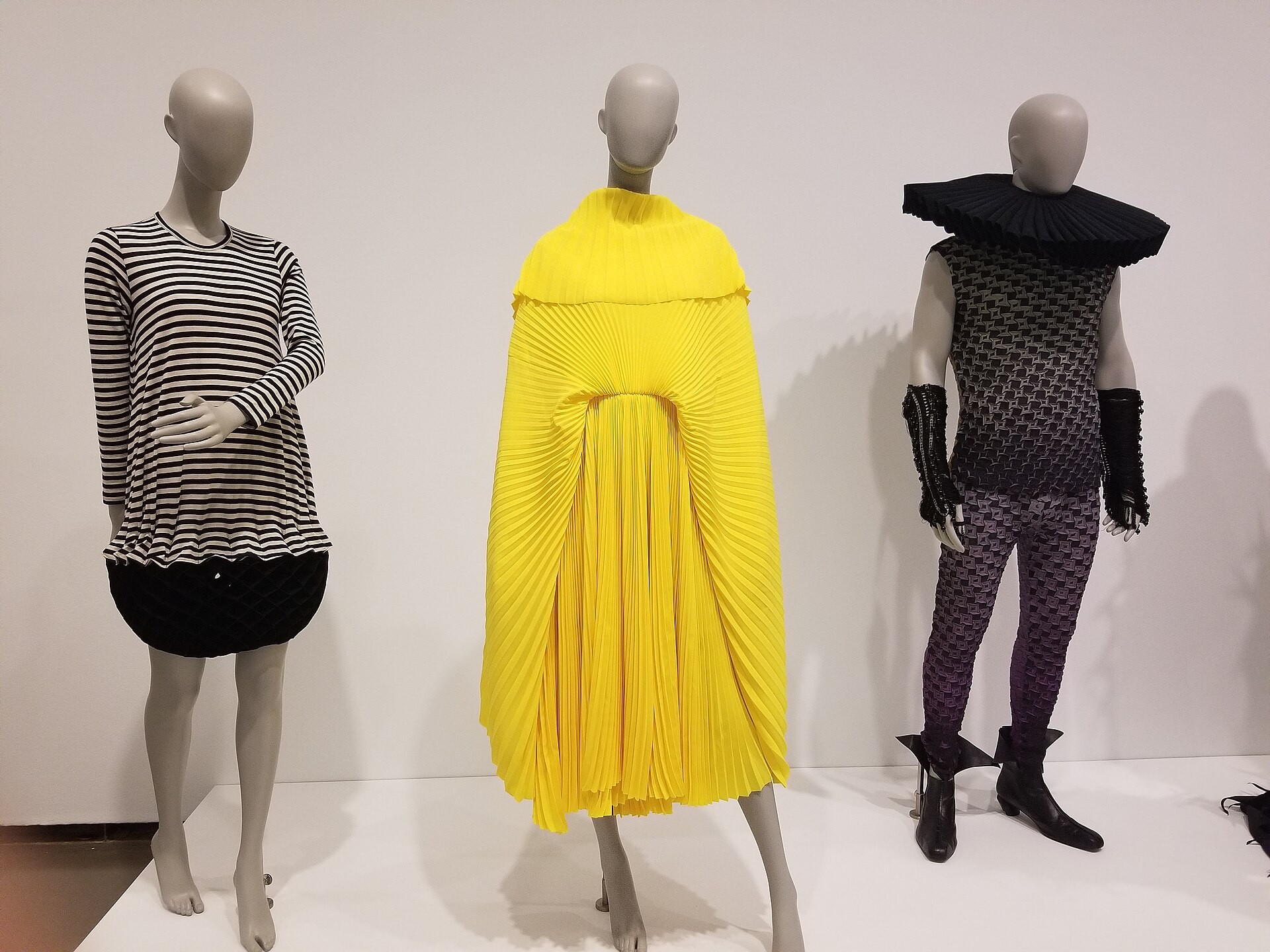 Ensembles by Junya Watanabe, Demna Gvasalia, and Goom Heo, respectively.