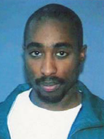 American rapper Tupac Shakur's photograph for a driving license in the U.S. State of California, c. 1996