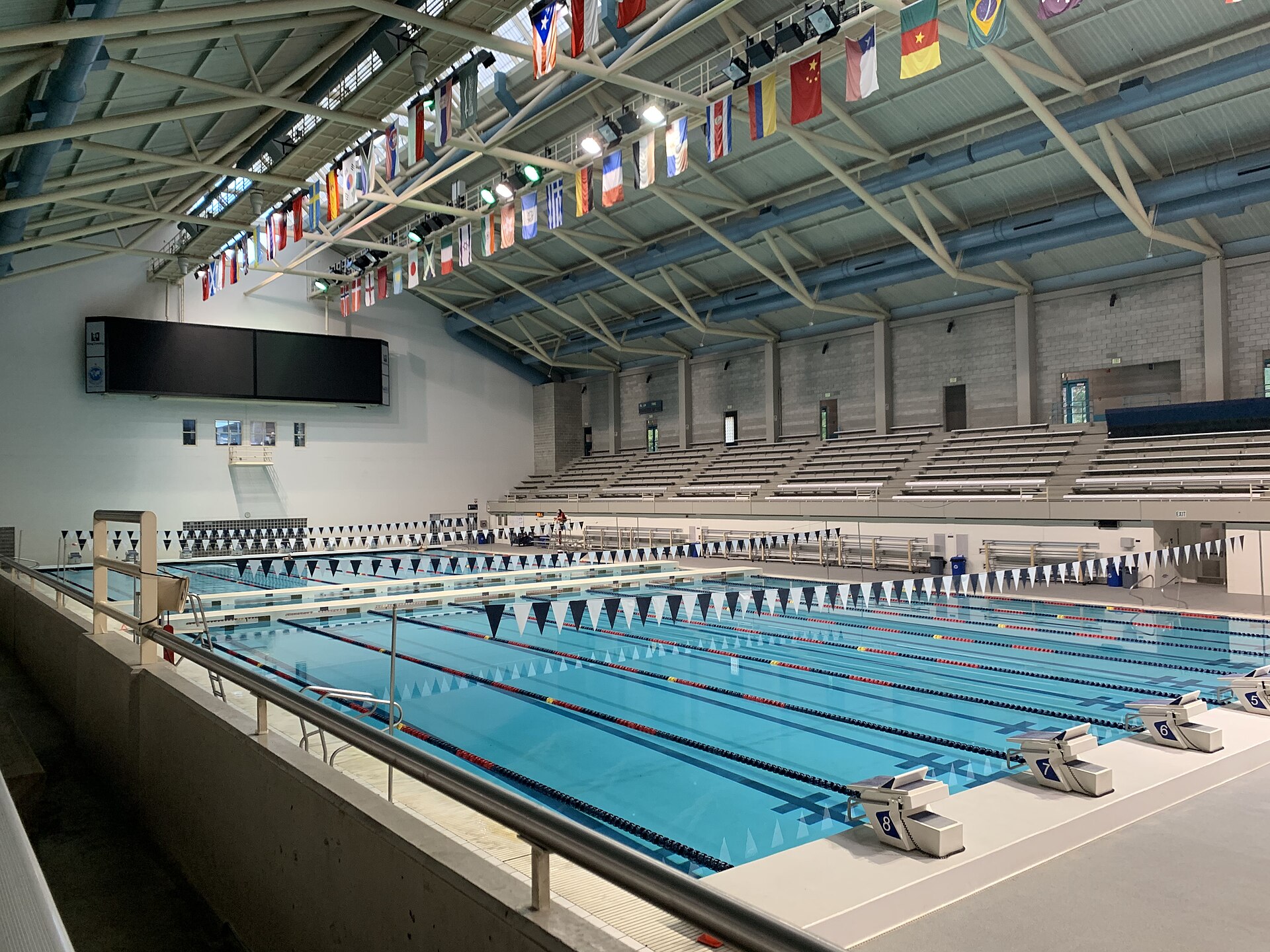 Competition pool with timing system board on the wall in the competition natatorium at King County Aquatic Center on 23 November 2022.I, Tanis Coralee Leonhardi, took this picture 