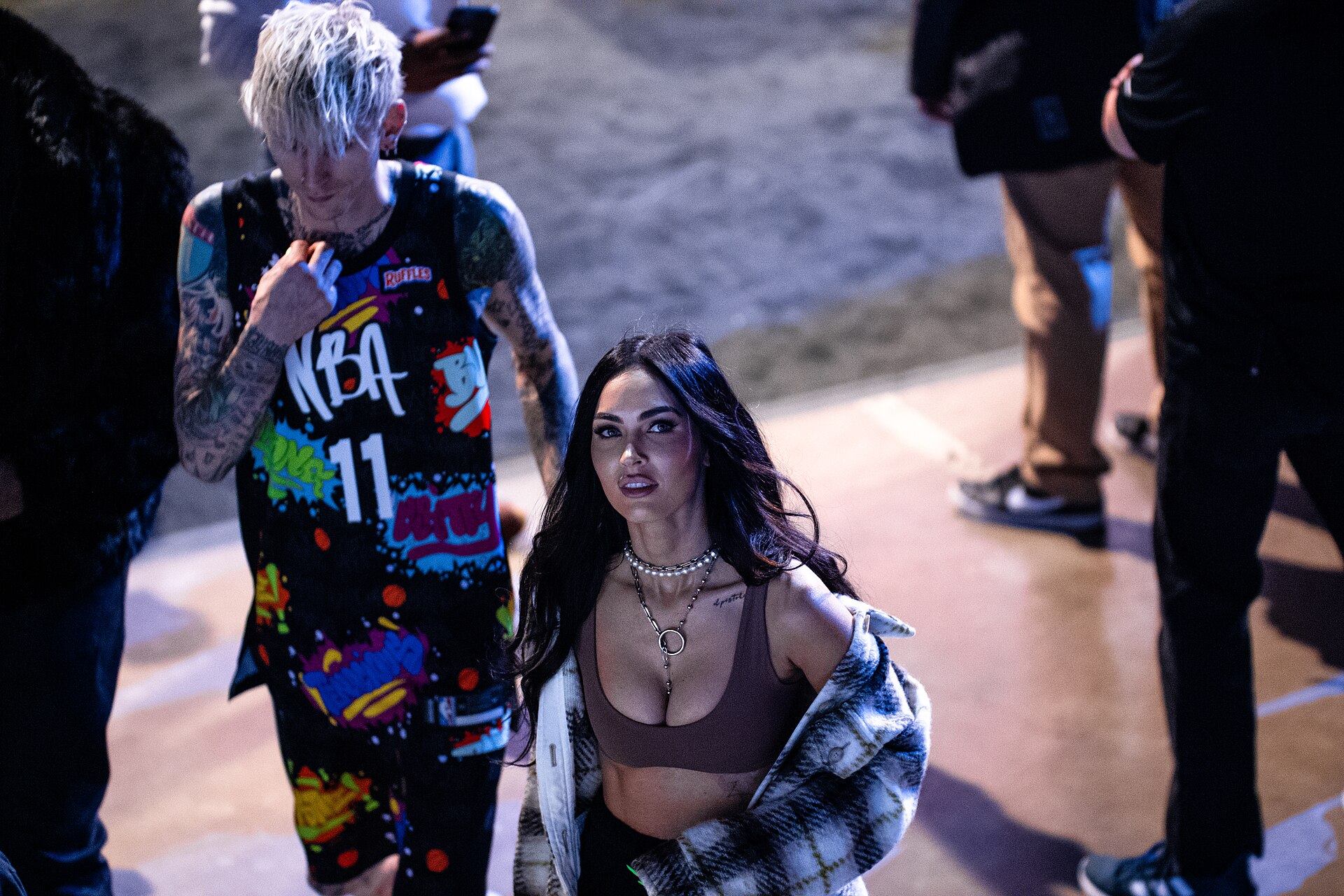 Machine Gun Kelly and Megan Fox walking together on February 18, 2022.