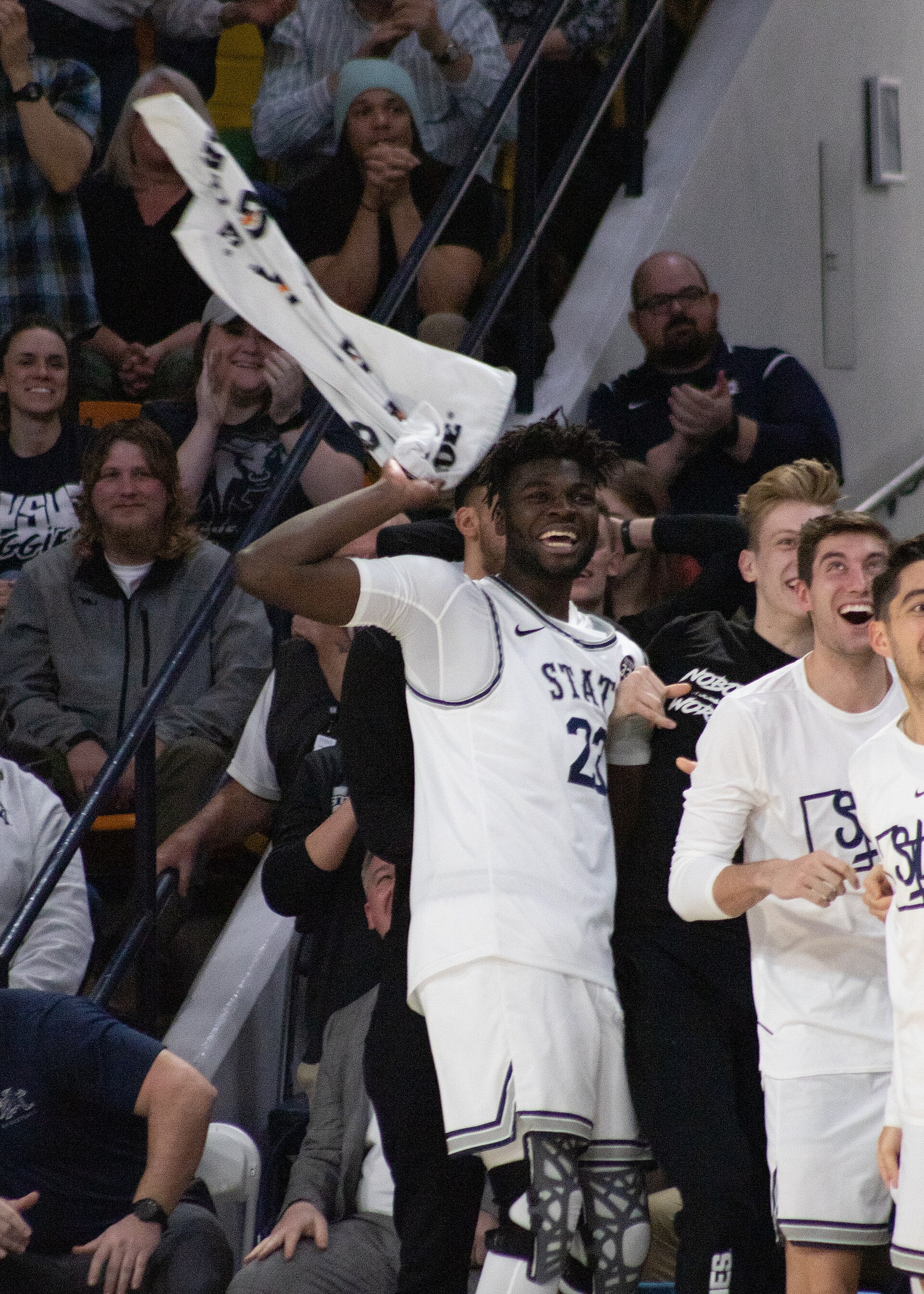 Portuguese national player Neemias Queta, playing for the Utah State University Aggies men's basketball team cheers on teammate. He would go on to be drafted by the Sacramento King