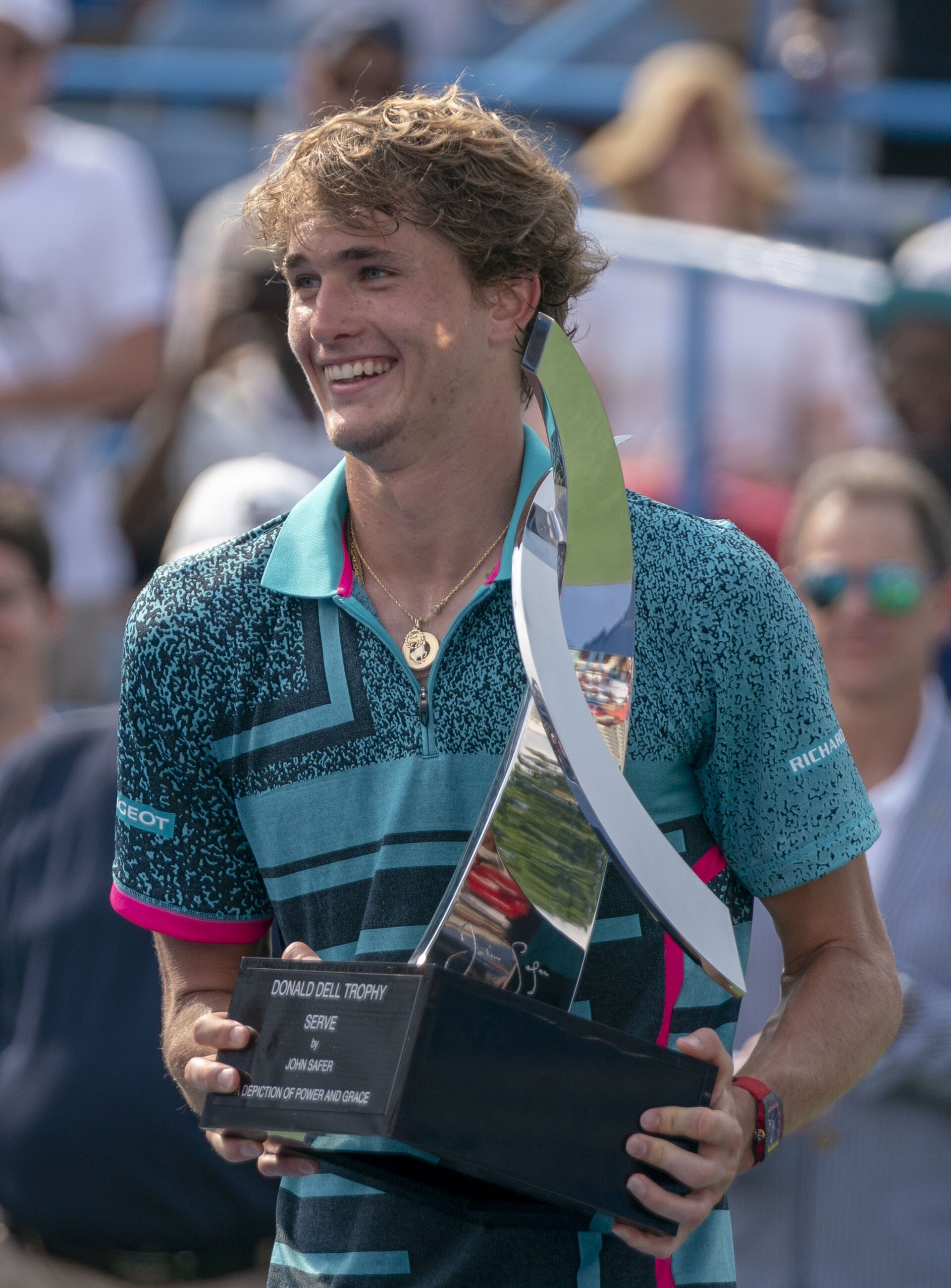 Alexander Zverev holds the men's singles trophy at the Citi Open tournament at Rock Creek Park Tennis Center on August 5, 2018 in Washington D.C..